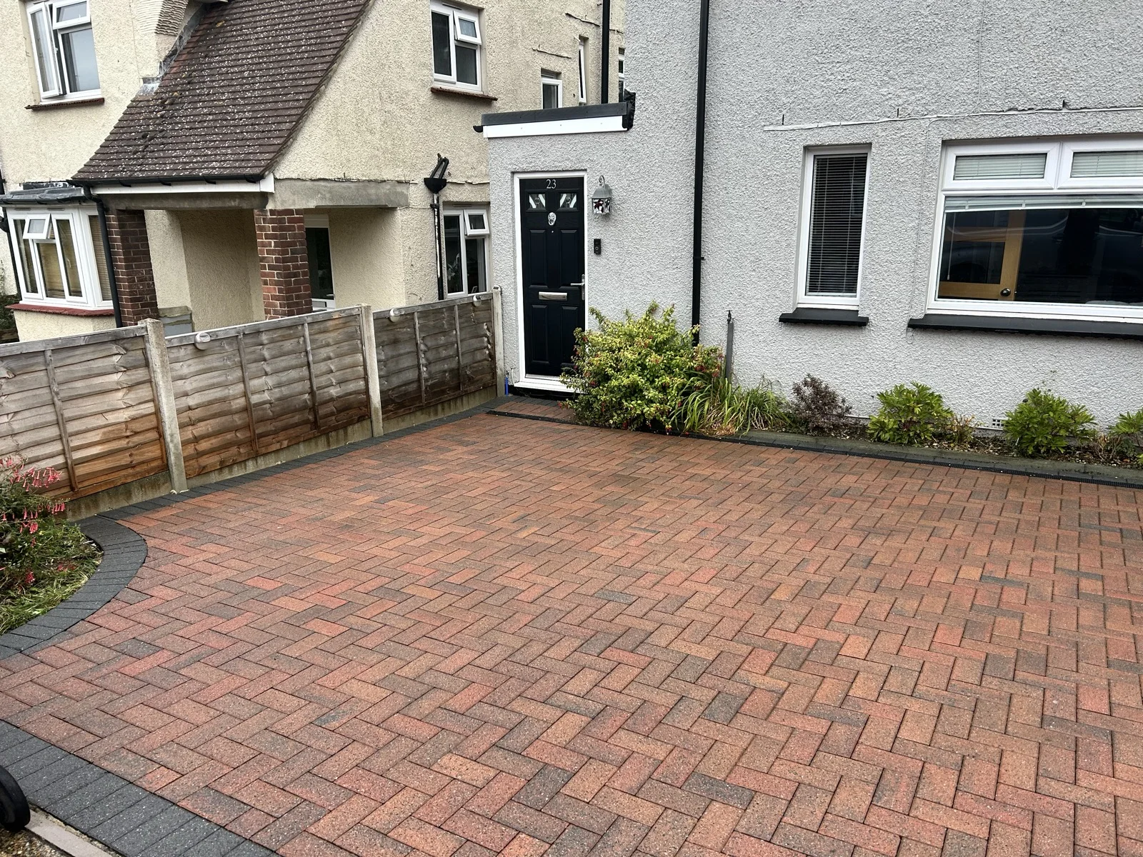 Freshly cleaned herringbone block driveway at a Kent property