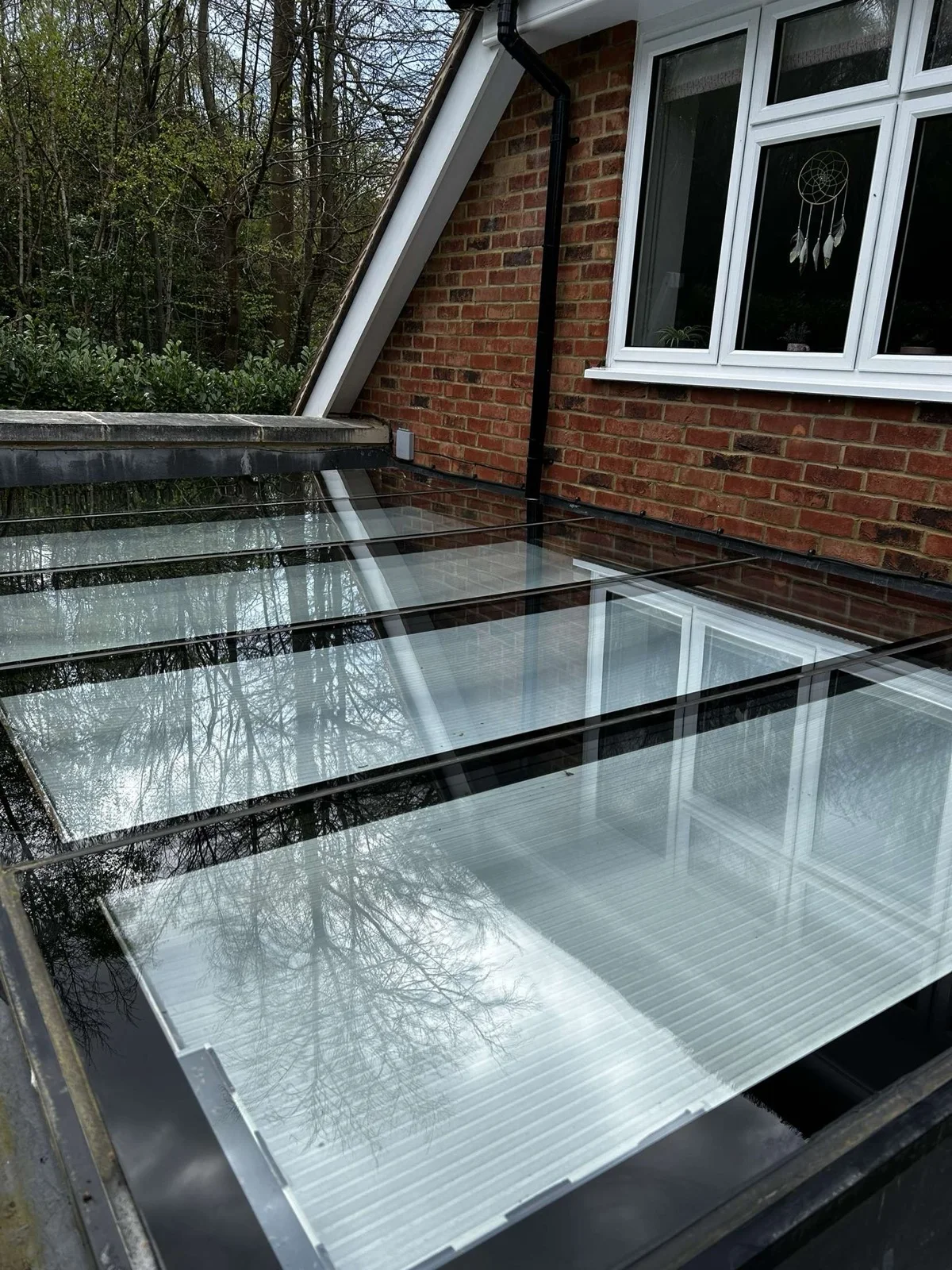 Clean glass roof panels on a residential extension
